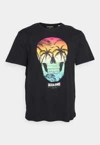 Black cotton t-shirt featuring a colorful skull graphic with palm trees and waves, vibrant gradient hues in orange, pink, and teal.