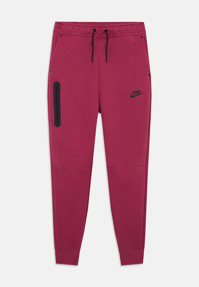 Vínové tepláky s pásom na stiahnutie, bočnou vreckom na zips, rebrovanými manžetami a čiernym logom Nike na hornej ľavej stehne.