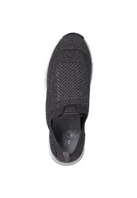 Black slip-on shoe made of breathable mesh. Features a textured surface, elasticated collar, and a rubber outsole with a small back tab.