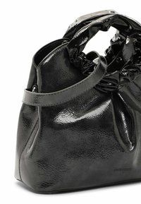 Black faux leather bag with a glossy finish, ruched handle, and detachable strap. Features a compact, structured shape with stitch detailing.