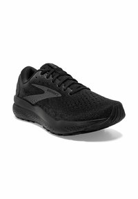 Scarpa da ginnastica nera con tomaia texturizzata, rete traspirante, lacci piatti, collo imbottito e suola in gomma resistente. Presenta un branding discreto.