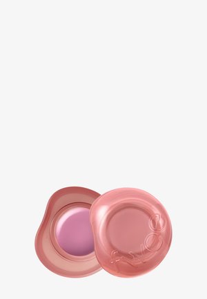 Petit récipient rond rose avec un couvercle translucide embossé de "Fixye", contenant une crème ou un baume violet à l'intérieur.