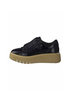 Baskets noires en cuir à enfiler avec fermetures éclair sur les côtés, semelle épaisse beige, pointure arrondie et détails texturés sur le dessus pour une meilleure adhérence.