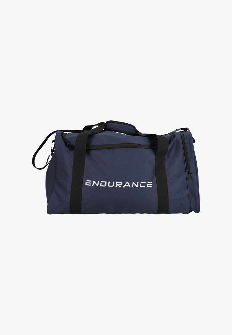 Merikasse, jossa on mustat hihnat, vetoketjullinen tasku ja valkoinen "ENDURANCE" -logo. Kestävä kangas ja rakenteellinen muoto. Säädettävä olkahihna.