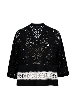 Schwarzes Oberteil mit V-Ausschnitt, komplexen Ausschnittmustern und kurzen Ärmeln, akzentuiert mit einem weißen Spitzenrand am Saum.
