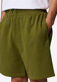 The North Face EASY REGULAR  - Tracksuit bottoms - forest olive