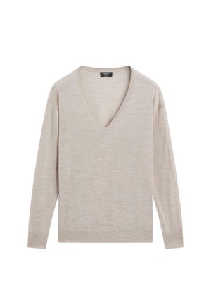 Lichtbeige V-hals trui gemaakt van zacht gebreid materiaal. Voorzien van lange mouwen en een ontspannen pasvorm met een subtiele textuur overal.
