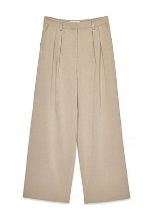 Beige wijde broek met voorplooien, zijzakken, riemlussen en een verborgen sluiting aan de voorkant.