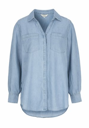 Hellblaues Denim-Hemd mit Knopfleiste, zwei Brusttaschen und langen Ärmeln mit gerafften Manschetten. Abgerundeter Saum unten.