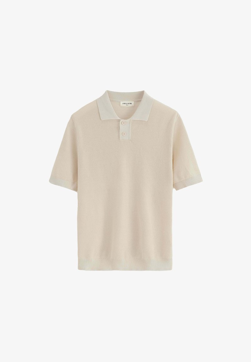 Polo en tricot beige avec un corps texturé, des manches courtes et un col contrasté. Doté d'une fermeture à deux boutons et de bords côtelés.