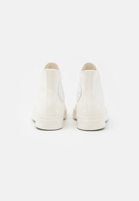 Converse Korkeavartiset tennarit - off-white