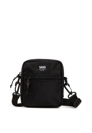 Sac bandoulière compact noir Vans avec poche avant zippée, sangle ajustable et patch logo "Off The Wall" sur fond blanc.