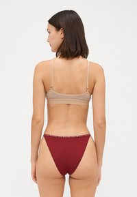 Tommy Hilfiger CHEEKY GIFT 3 PACK - Briefs - rouge/star/ornamental green