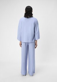 Object Blusa - brunnera blue