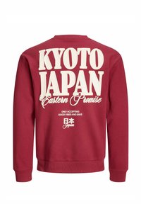 Bordeauxrode sweatshirt met opvallende witte tekst: "KYOTO JAPAN" en "Eastern Promise", met kleinere tekst eronder. Zachte stof en geribbelde manchetten.