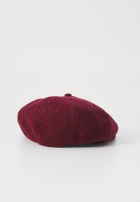Burgundy wool beret with a rounded shape, subtle stitching detail, and a small top button. Smooth texture with a dense felt appearance.