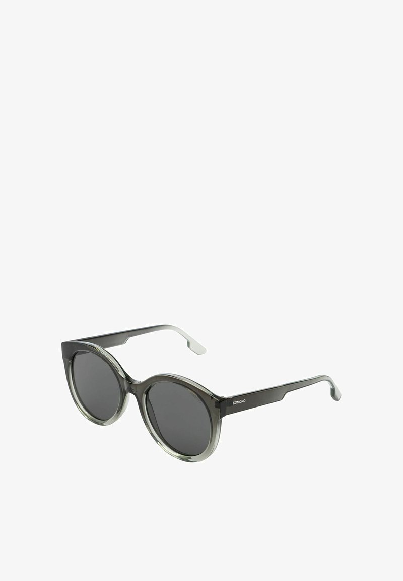 Ronde zonnebril met een bicolor zwart en grijs frame, donker getinte lenzen en slanke plastic armen. Minimalistische branding aan de zijkant.