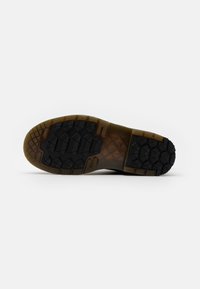 Dr. Martens Stivaletti stringati - black