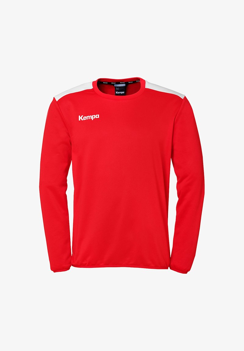 Rød langærmet sportsbluse lavet af åndbart stof, med hvide skulderdetaljer og et "Kempa" logo på forsiden.