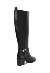 Black knee-high boot featuring a smooth leather front, textile back, a round toe, block heel, and a decorative gold buckle detail on the strap.