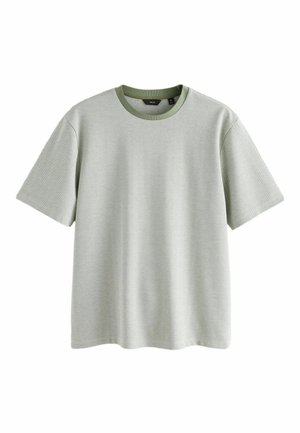 Világoszöld, rövid ujjú kötött póló finom halszálka mintával és sötétebb zöld bordázott nyakkal, középméretű.