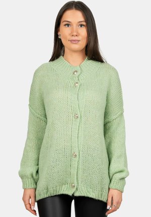 Light green oversized cardigan with a ribbed neckline, button closure, and textured knit pattern. Features wide sleeves and a loose fit.
