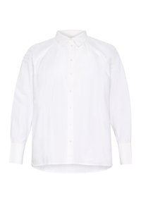 Chemise blanche à boutons, avec col classique, manches longues, ourlet arrondi et épaules raglan. Fabriquée dans un tissu léger et lisse.