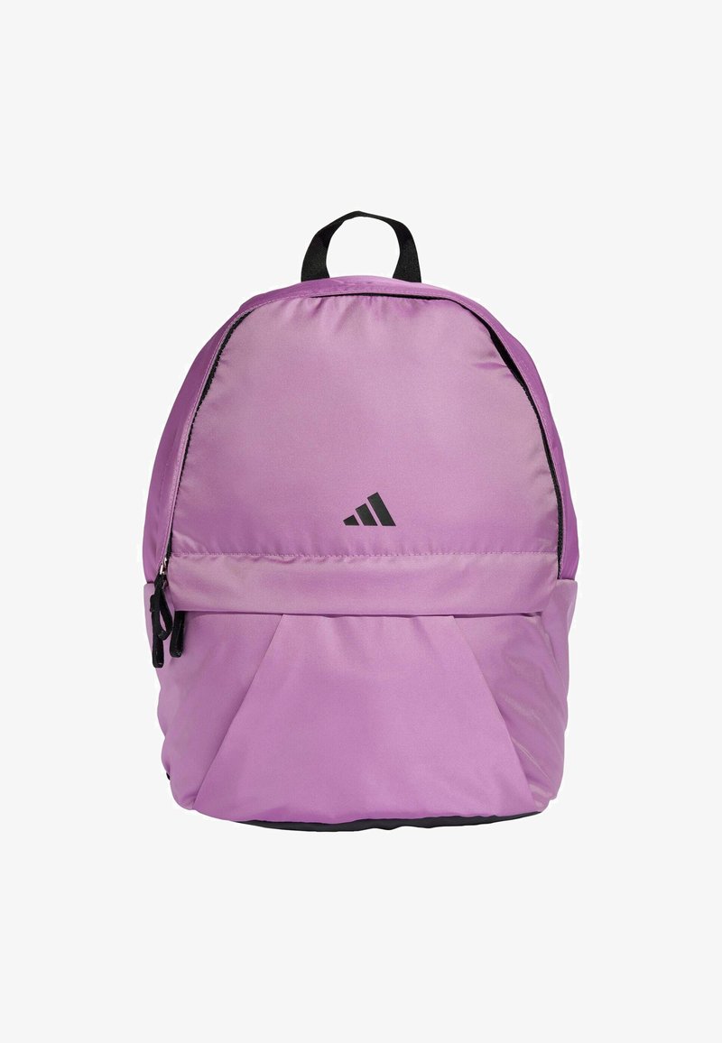 Zaino in nylon viola dalla forma arrotondata, con una cerniera nera, manico nero e un piccolo logo nero sulla parte anteriore.