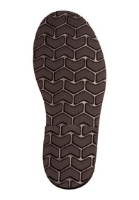 Semelle de chaussure en caoutchouc noir présentant un motif à chevrons. La surface est texturée avec des crêtes pour une adhérence et une traction améliorées.