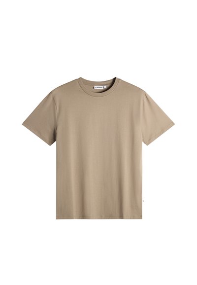 T-shirt beige a maniche corte con scollo rotondo, orlo dritto e una piccola etichetta del marchio sul retro all'interno del colletto.
