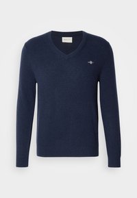 - Sweter