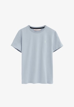 T-shirt azzurro chiaro a maniche corte con collo rotondo, piccolo logo bianco sul petto a sinistra e etichetta "Polo Club" all'interno del colletto.