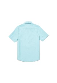 Camisa de manga corta azul claro hecha de una tela suave, con un dobladillo redondeado y un sutil patrón de puntos con pequeños acentos geométricos.