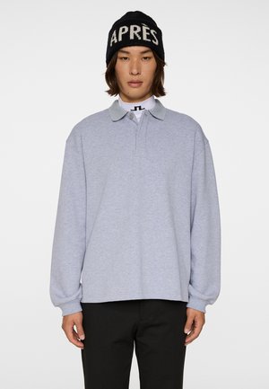 - Bluzka z długim rękawem