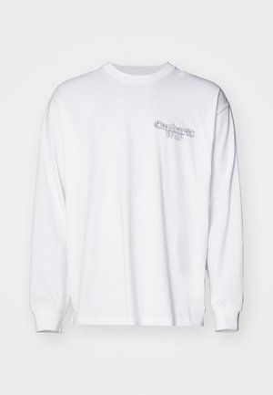 White long-sleeve t-shirt in cotton, featuring a small, textured gray logo on the left chest area. Regular fit with ribbed cuffs.