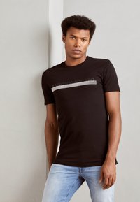 Antony Morato - SUPER SLIM FIT WITH RUBBER INJECTION LOGO PRINT - T-Shirt print - black Thumbnail-Bild 1