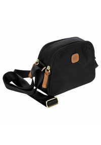 Borsa a tracolla in tessuto nero con forma rettangolare, chiusure a doppia cerniera, dettagli in pelle color cuoio e hardware color oro. Include una tracolla regolabile.