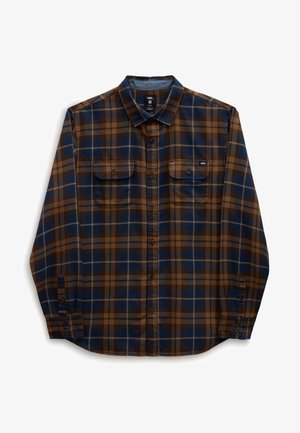 Chemise à carreaux à manches longues en marron et bleu marine, avec deux poches poitrine boutonnées et un col classique.