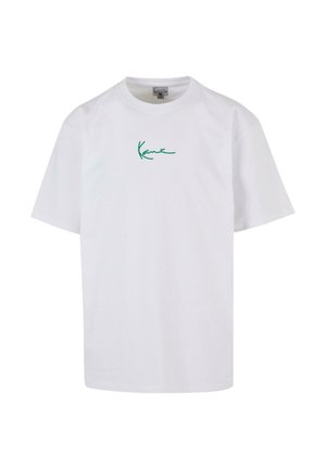 White cotton T-shirt featuring short sleeves and a round neckline. It has a green signature logo printed on the left chest area.