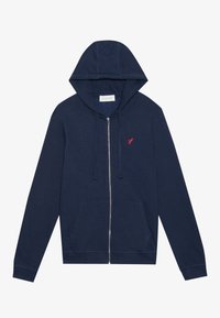 Marineblå zip-up hættejakke lavet af blødt stof, med en frontlomme, snøre-hætte og broderet rødt fuglelogo på brystet.