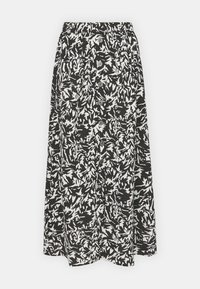 Jupe longue noir et blanc arborant un motif de feuilles abstrait audacieux, une taille élastique et des accents de boutons sur le devant. Tissu léger.