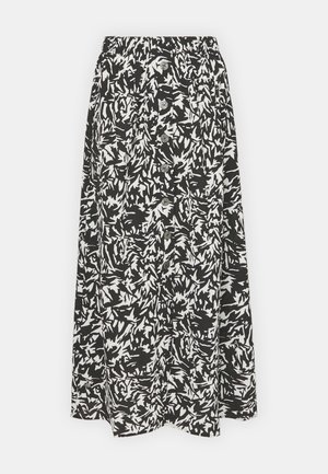 Long black and white skirt featuring a bold abstract leaf pattern, an elastic waistband, and button accents down the front. Lightweight fabric.