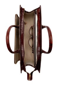 Brown crocodile-patterned leather bag with double handles, zip closure, and structured interior featuring compartments for organization.