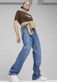 Puma SOFTRIDE ORLA DREAM - Chaussures de running sur route - white gold matte gold