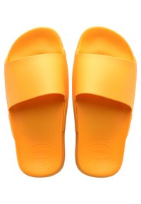 Infradito arancioni in gomma con una soletta testurizzata e una larga tracolla curva. Design leggero adatto per l'uso quotidiano. Taglia indicata 37-38.