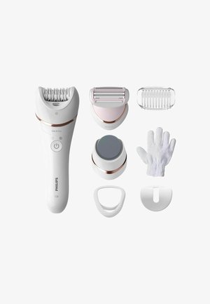 Appareil d'épilation Philips en blanc avec des accents en or rose ; comprend divers accessoires : tête d'épilateur, tête de rasoir, gant exfoliant et capuchon.