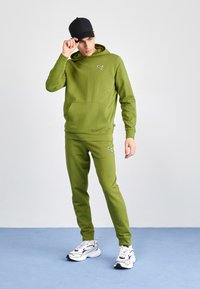 Puma BETTER ESSENTIALS - Træningsbukser - olive green