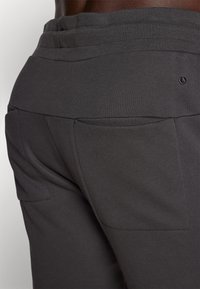 Björn Borg ESSENTIAL SWEATPANTS - Treningo apatinė dalis - pirate black
