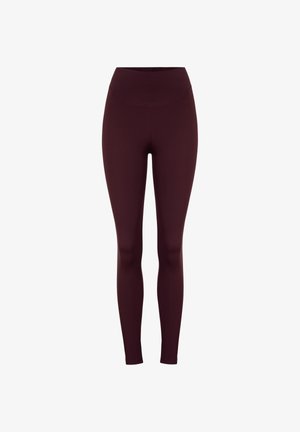Weinrote Leggings mit hohem Bund, hergestellt aus glattem, dehnbarem Stoff. Die enganliegende Passform sorgt für eine schlanke Silhouette.