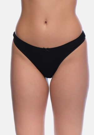 Schwarzer Baumwoll-Thong mit weichem Bündchen, das ein kleines zentrales Schleifchen-Detail aufweist, glatte Textur und minimalistisches Design.